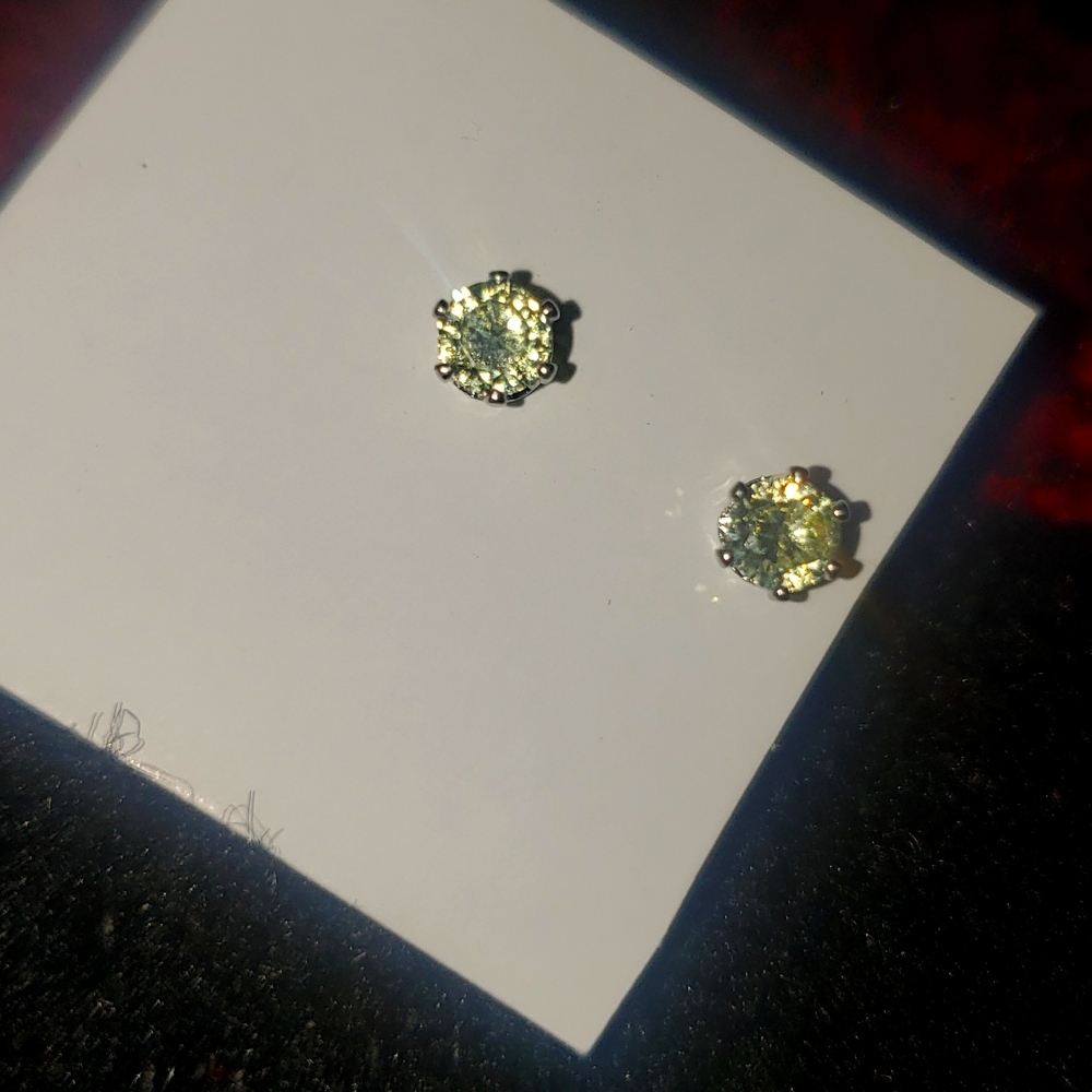 Beautiful green diamond  Crystal earrings set in silver